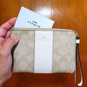 Coach Corner Zip Wristlet In Signature Canvas